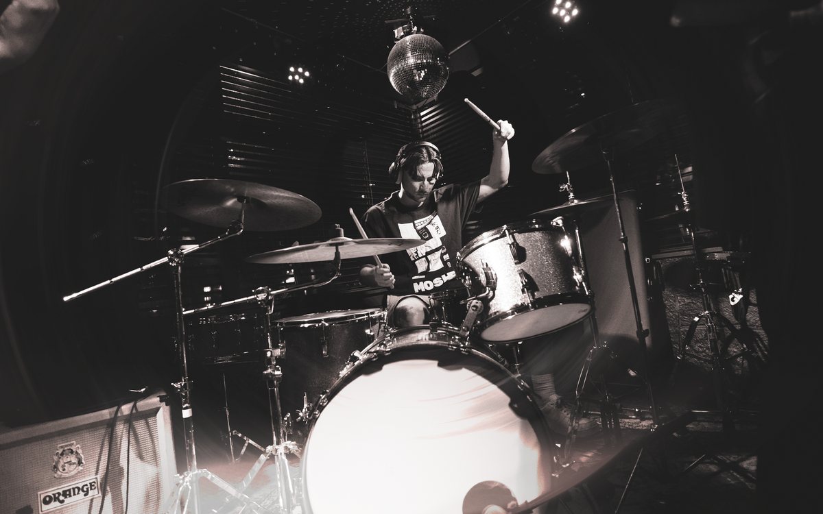 Jack playing drums on stage